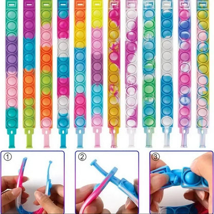 12/24/36PCS Silikonivärikäs kuplaranneke – Lasten juhlasuosikit, syntymäpäivälahjat, häämatkalaiset, karnevaalit ja lomarannekkeet