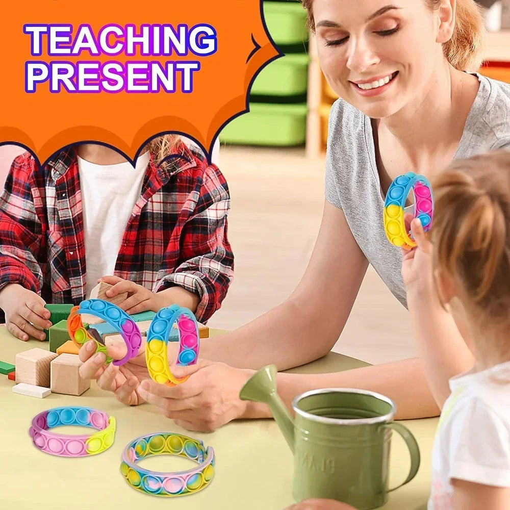 12/24/36PCS Silikonivärikäs kuplaranneke – Lasten juhlasuosikit, syntymäpäivälahjat, häämatkalaiset, karnevaalit ja lomarannekkeet